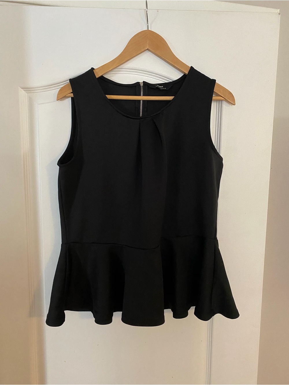 Sleeveless Black Peplum Top